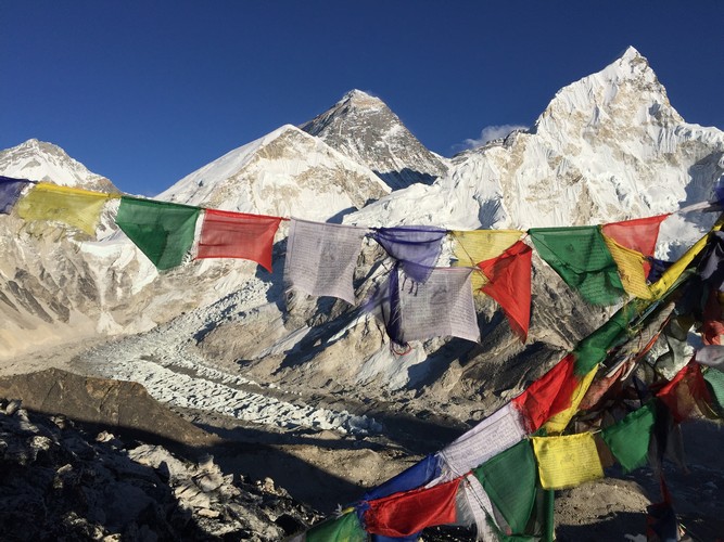 Everest peak and prayer flag seen from base camp of Everest